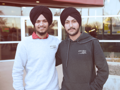 two men posing in gpc apparel